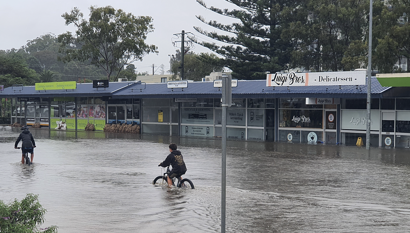 Shutterstock flooded town kids bike crop