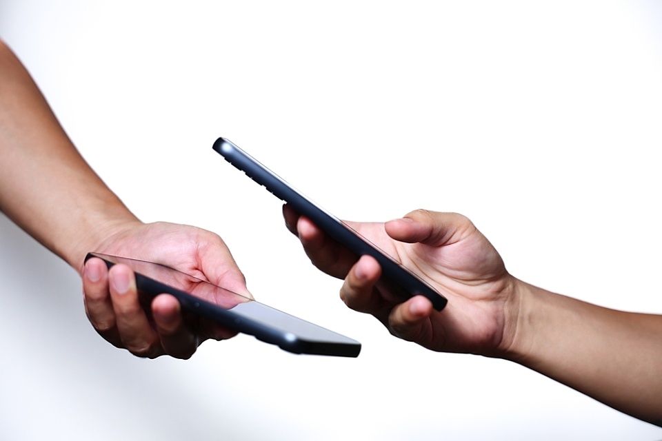 Charities making the switch from tin rattling to phone-tap fundraising