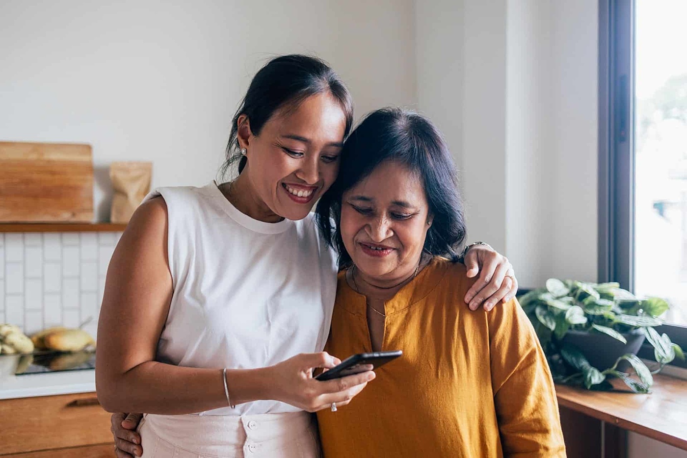 Mother and daughter app mobile phone