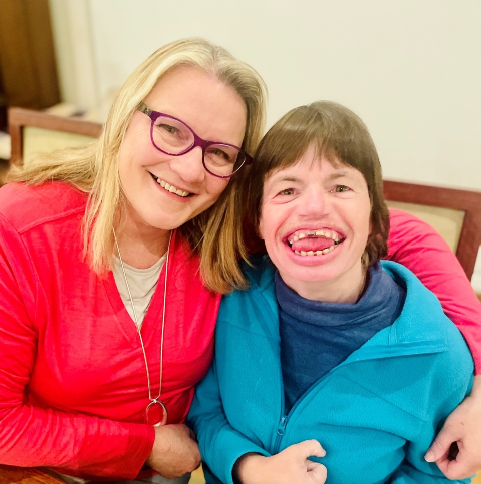 Samantha with her sibling Alison